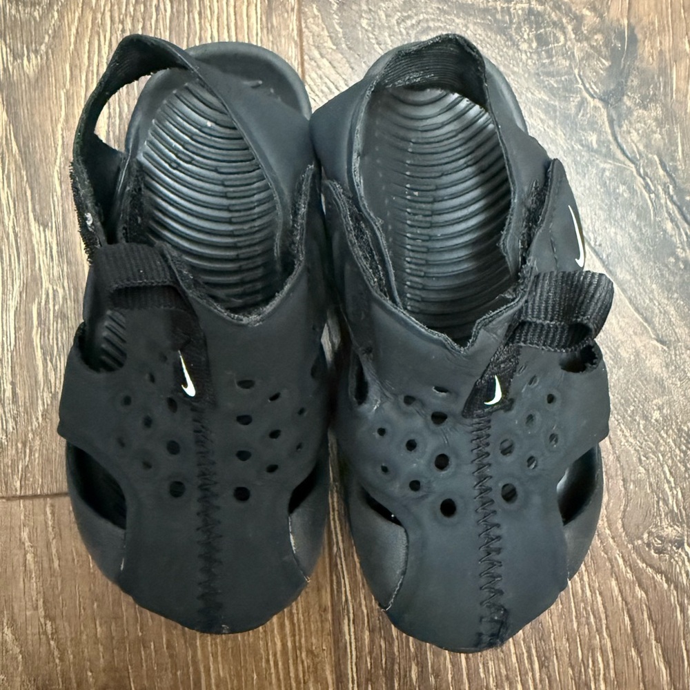 Nike Black Sandals with Adjustable Strap and Textured Footbed